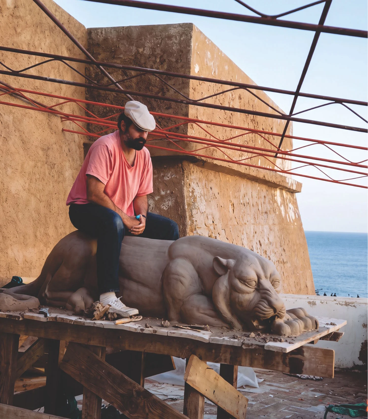 Fred Parhad with the lion, on location