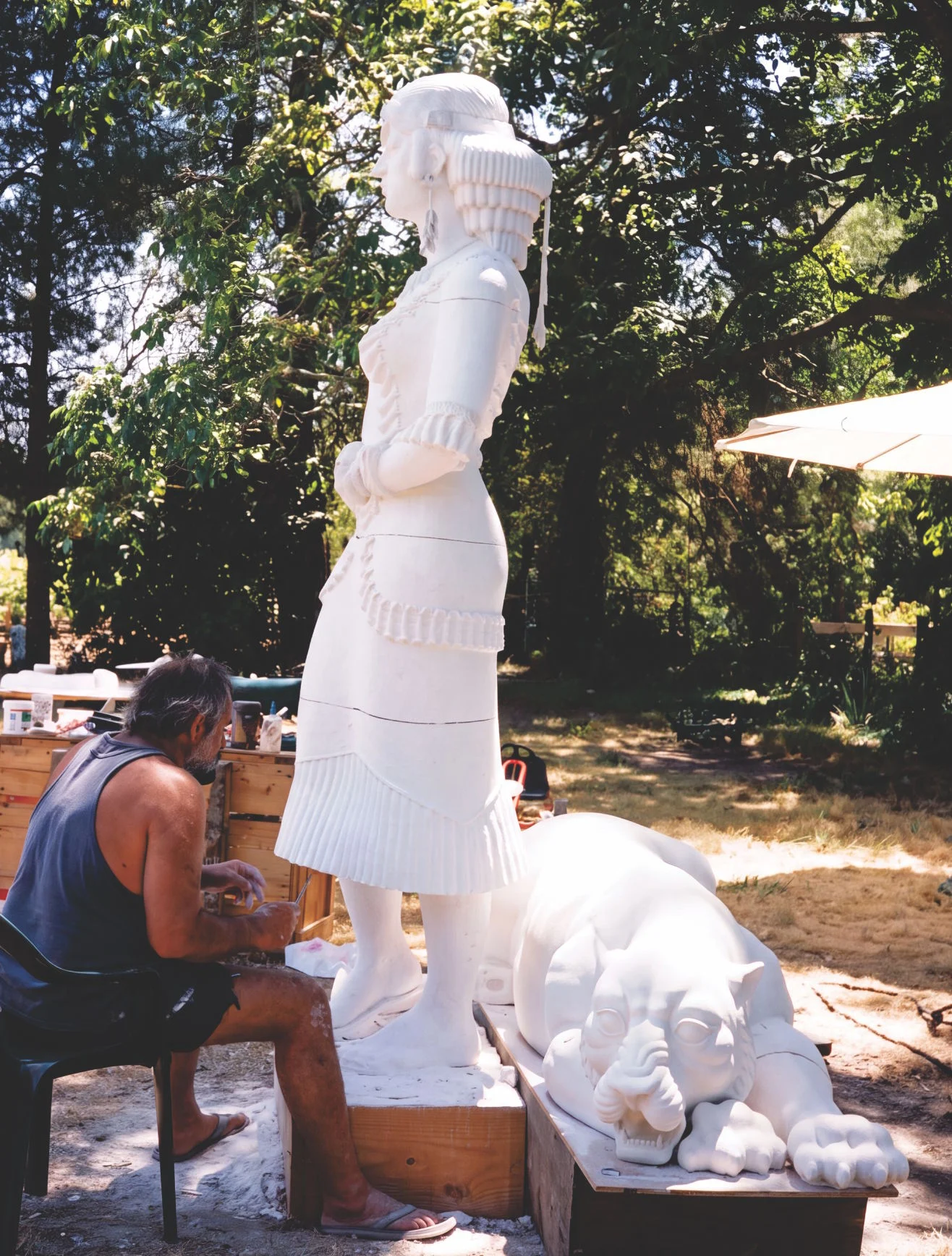 Fred Parhad carving in plaster